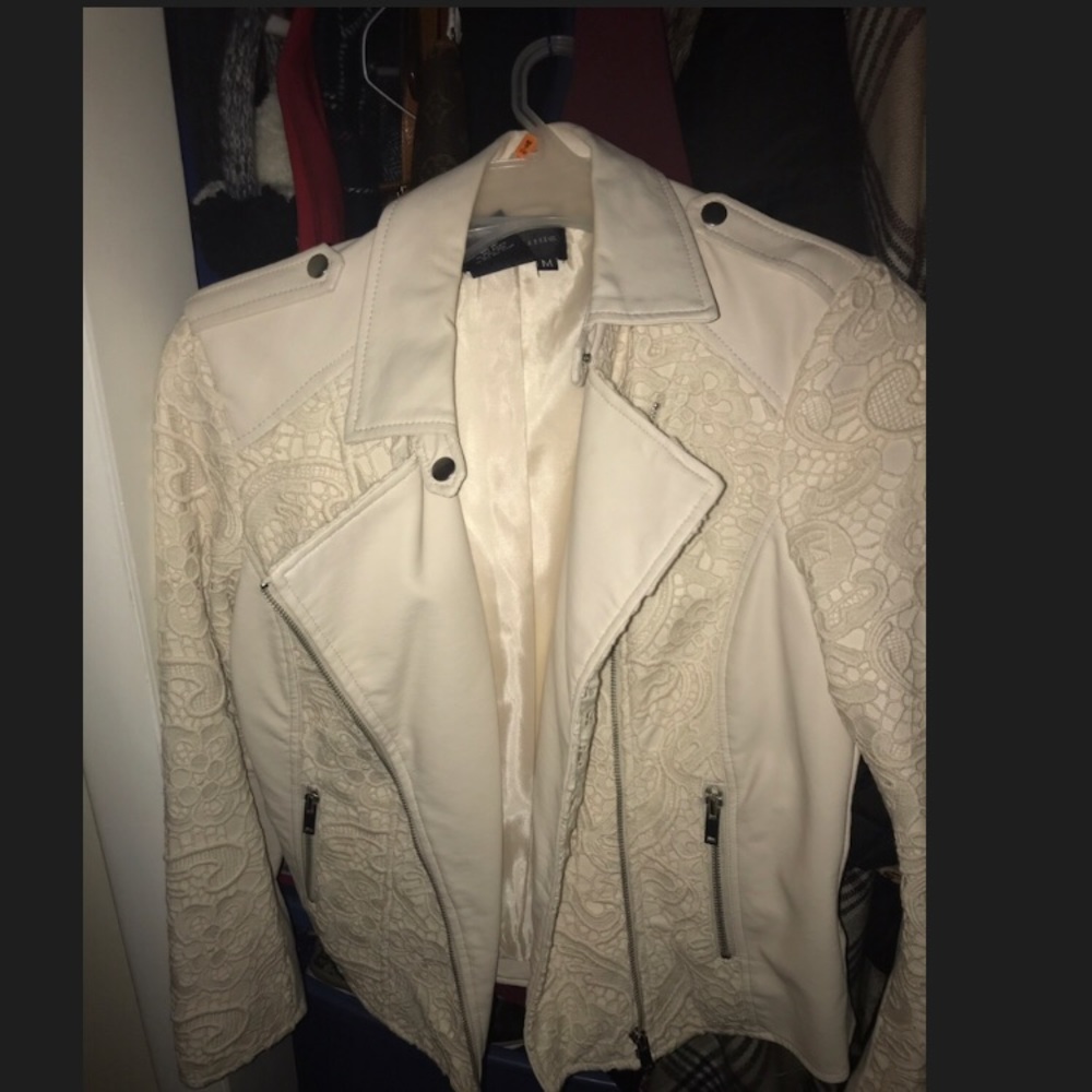 Brand New. Never worn. Embroidered Moto Jacket.